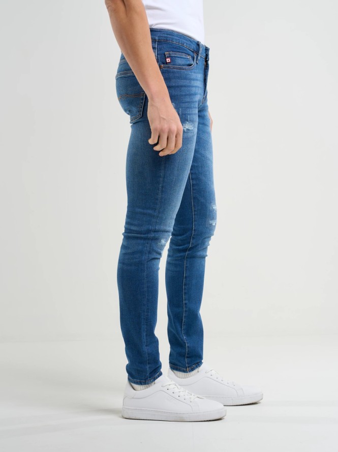 Jeansy męskie skinny z przetarciami niebieskie Deric 368