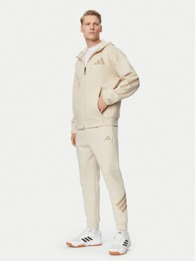 adidas Spodnie dresowe Future Icons 3-Stripes KD5206 Beżowy Regular Fit