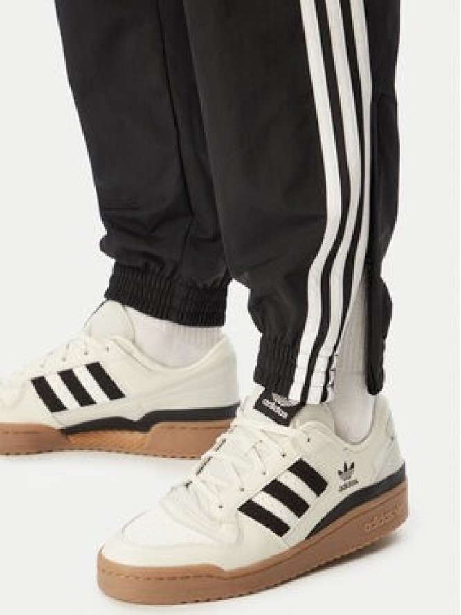 adidas Spodnie dresowe Firebird Woven KE1371 Czarny Regular Fit