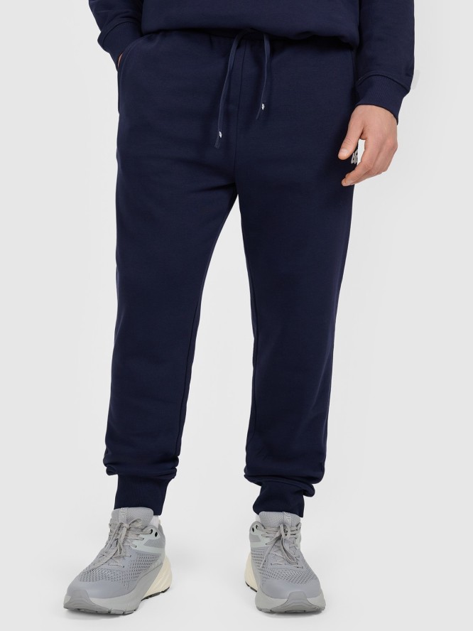 4F Spodnie dresowe joggery męskie - granatowe L