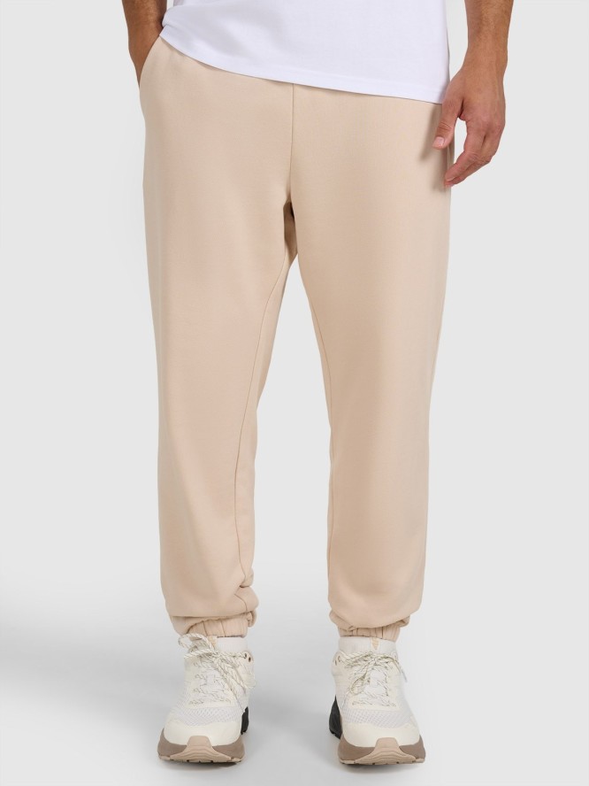 4F Spodnie dresowe joggery męskie - beżowe L