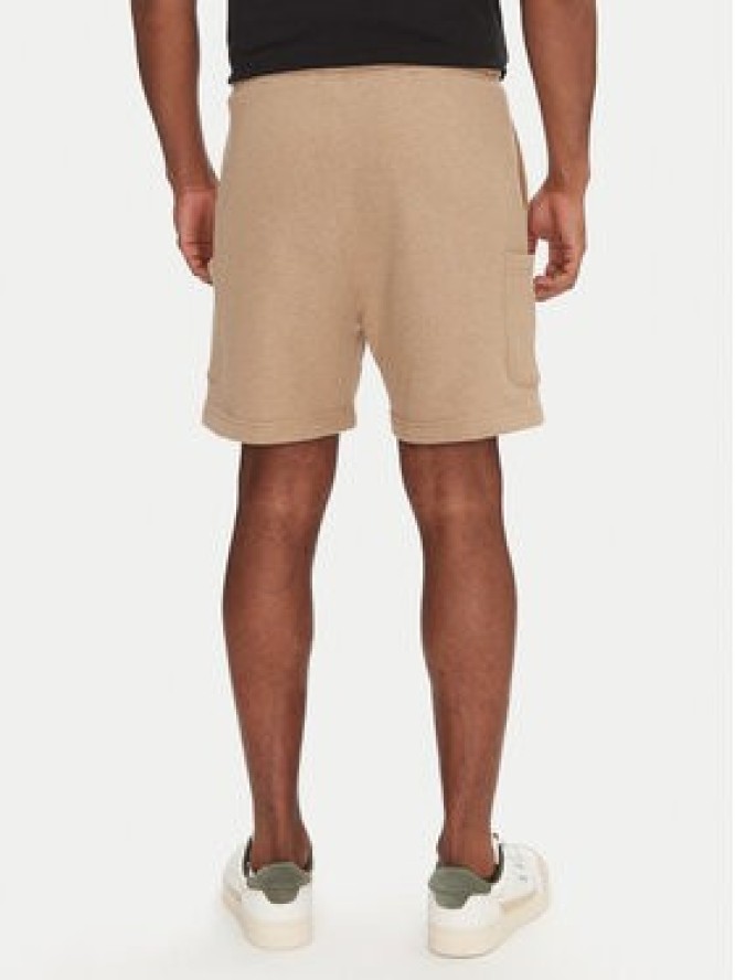 Tommy Jeans Szorty sportowe Badge DM0DM18479 Beżowy Regular Fit