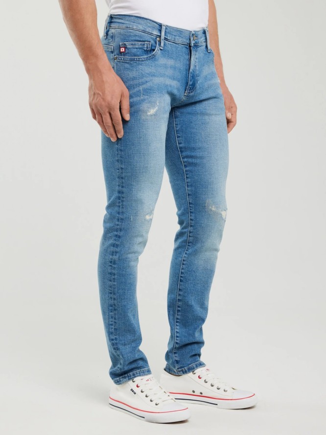 Jeansy męskie skinny z przetarciami niebieskie Jeffray 298