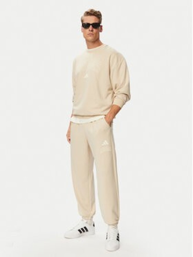 adidas Spodnie dresowe Seasonal Essentials Collegiate French Terry Cuffed KF4265 Beżowy Regular Fit