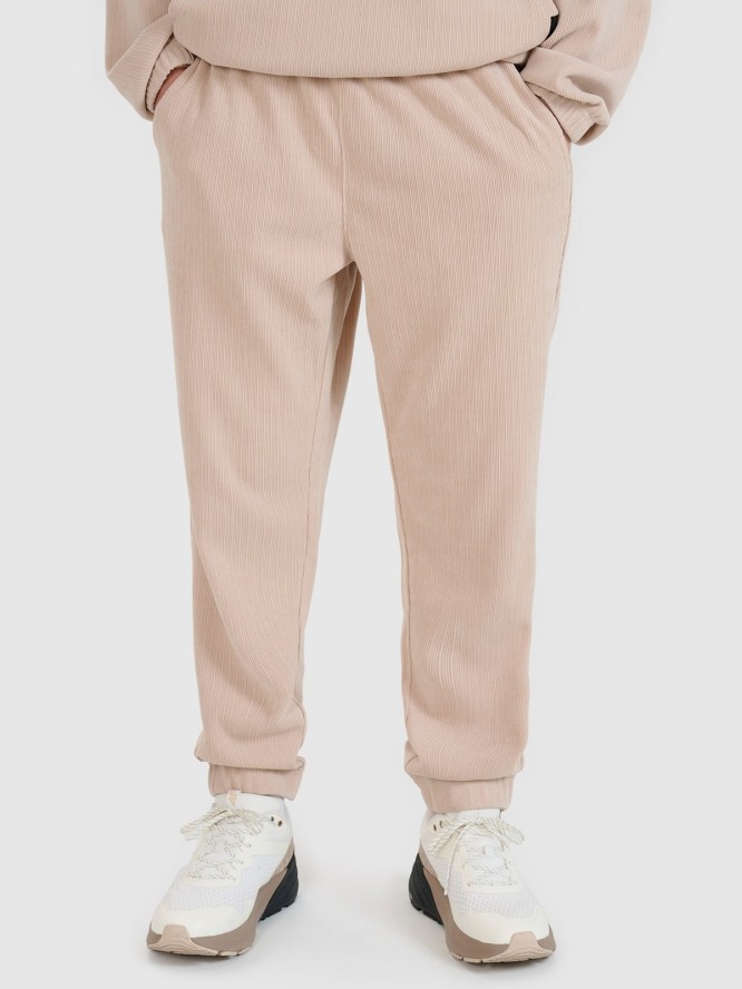 4F Spodnie dresowe joggery męskie - beżowe XXL