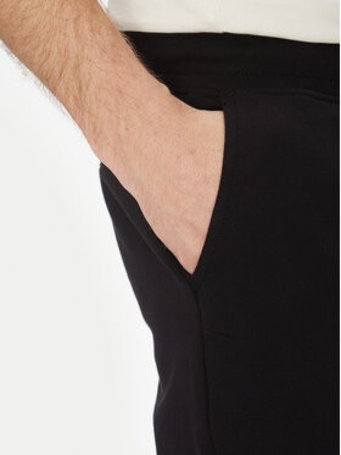 Calvin Klein Jeans Spodnie dresowe Painted J30J327535 Czarny Regular Fit