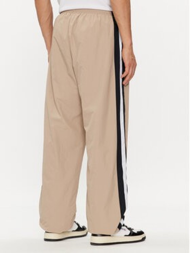 Champion Spodnie dresowe 220008 Beżowy Custom Fit