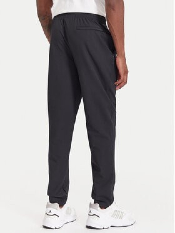 Under Armour Spodnie dresowe Unstoppable 6003861 Czarny Loose Fit