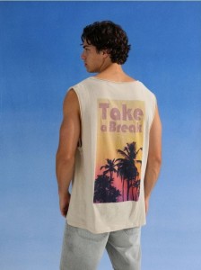 Bawełniany tank top z nadrukiem na plecach - kremowy