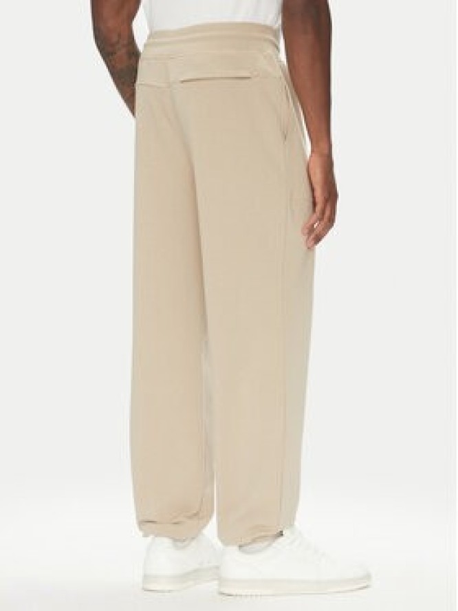 Guess Spodnie dresowe U5RB00 KCO31 Beżowy Regular Fit