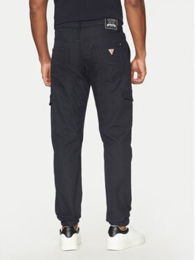 Guess Spodnie materiałowe M5RB54 WGXY1 Granatowy Slim Fit