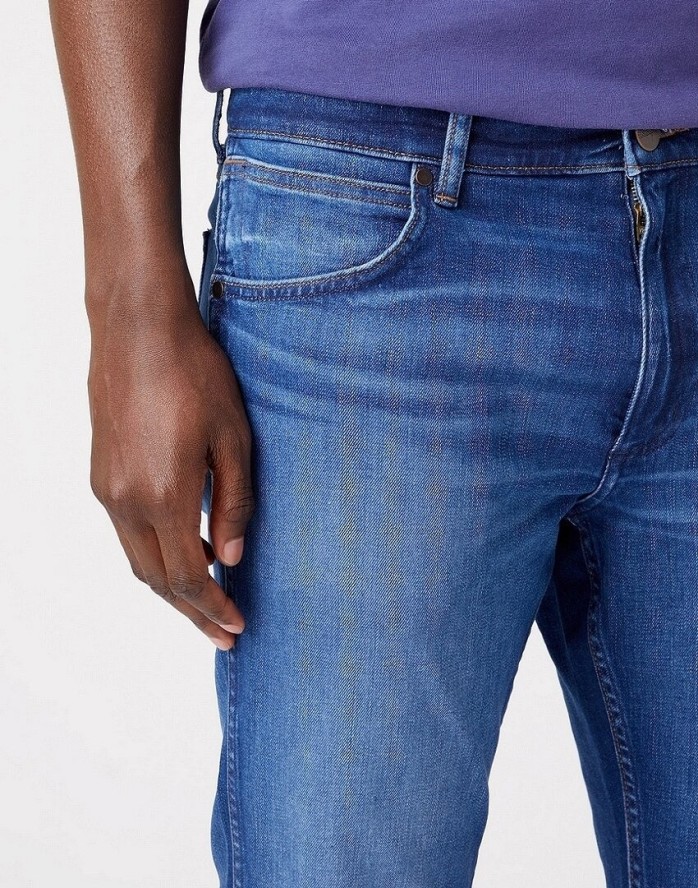 WRANGLER GREENSBORO MĘSKIE SPODNIE JEANSOWE JEANS DŻINSY HEARTBREAKER W15QYI23A 112320205