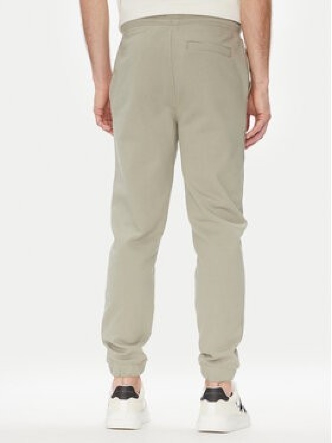 Calvin Klein Jeans Spodnie dresowe Painted J30J327535 Zielony Regular Fit