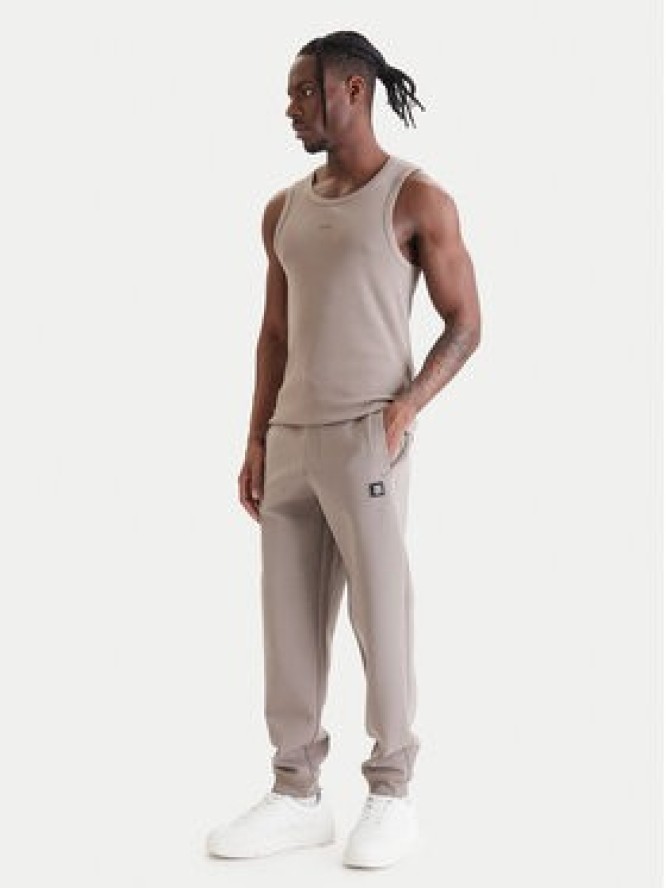 HUGO Spodnie dresowe Dimacs 50533695 Beżowy Relaxed Fit