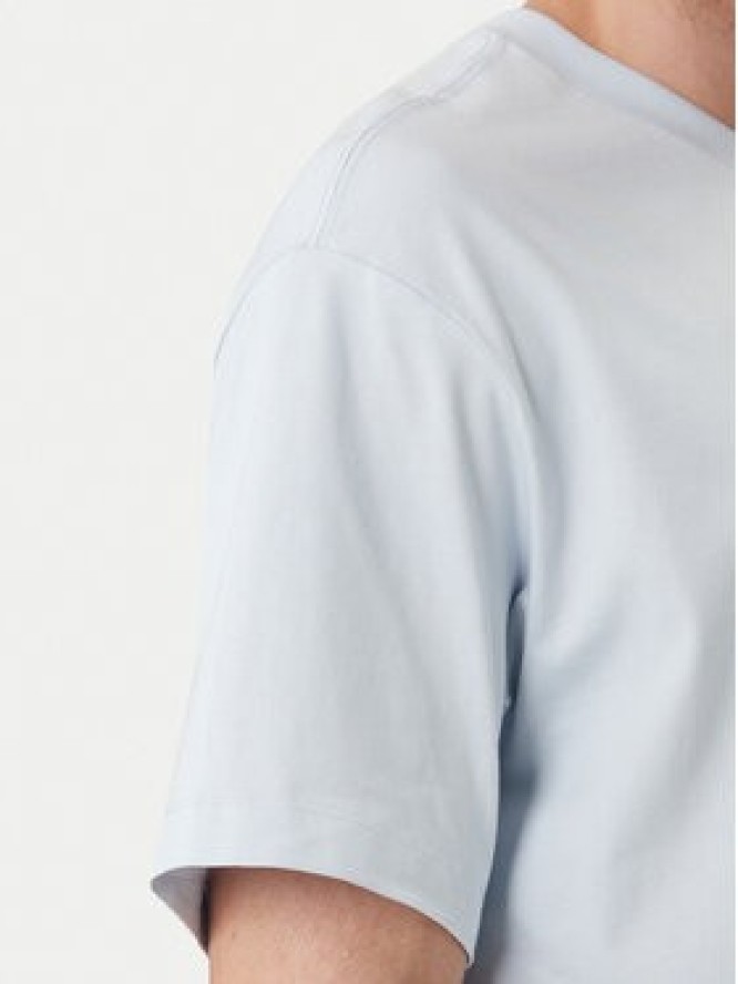 Calvin Klein T-Shirt Emblem Graphic LV14RF817G Błękitny Regular Fit