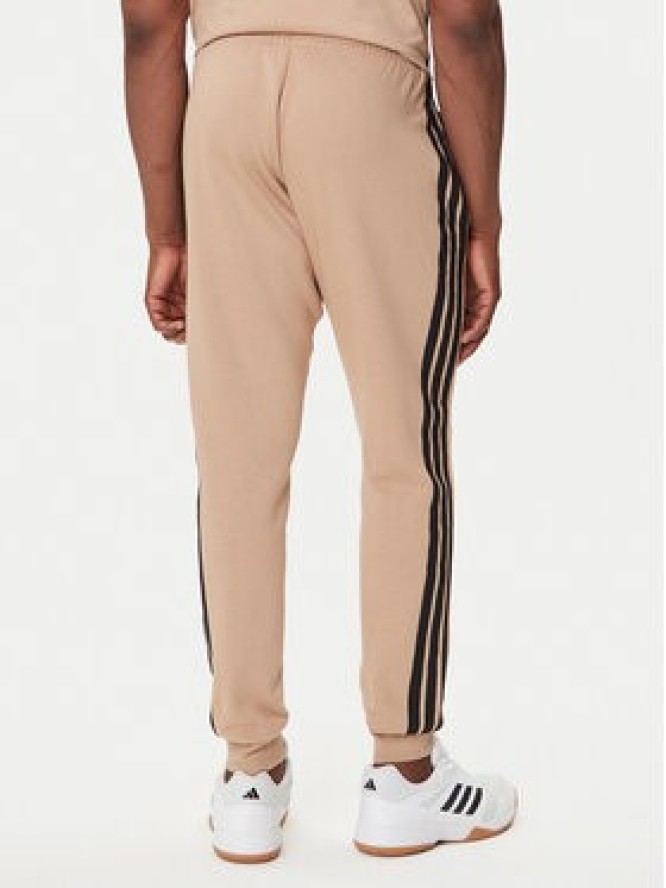adidas Spodnie dresowe Essentials 3-Stripes JX0712 Beżowy Regular Fit