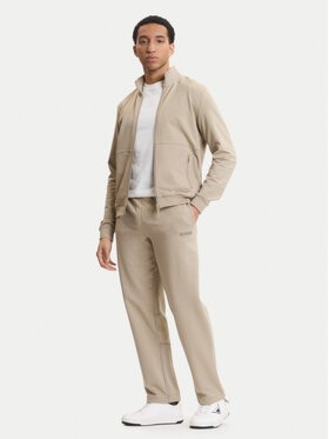 Guess Spodnie dresowe Z6GB01 K2834 Beżowy Regular Fit