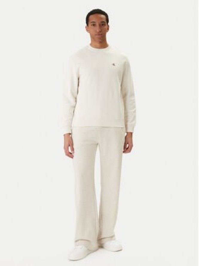 Calvin Klein Jeans Spodnie dresowe Embossed Monologo LV047F206G Beżowy Wide Leg