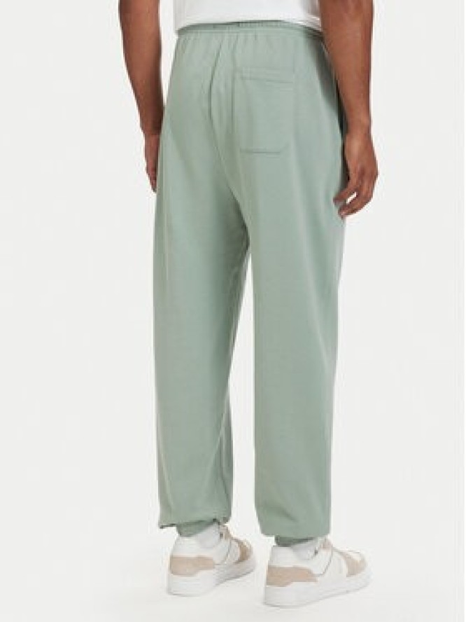 Tommy Hilfiger Spodnie dresowe Essential UM0UM03911 Zielony jasny Relaxed Fit