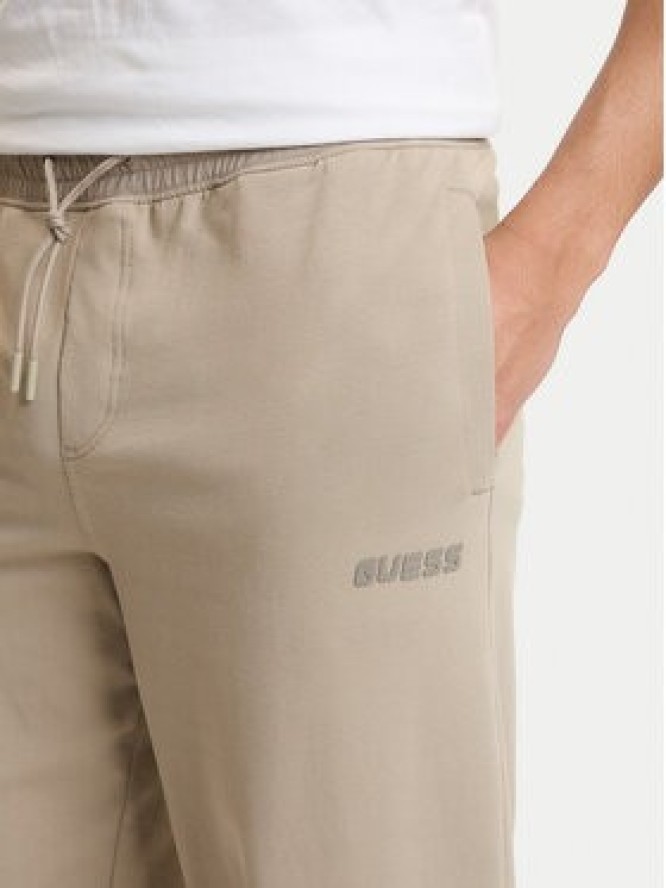 Guess Spodnie dresowe Z6GB01 K2834 Beżowy Regular Fit