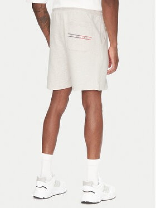 Tommy Jeans Szorty sportowe Entry Graphic DM0DM21369 Beżowy Regular Fit
