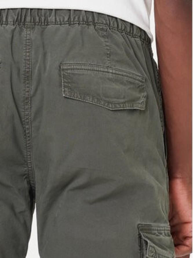 Tommy Jeans Spodnie materiałowe DM0DM22003 Zielony Regular Fit