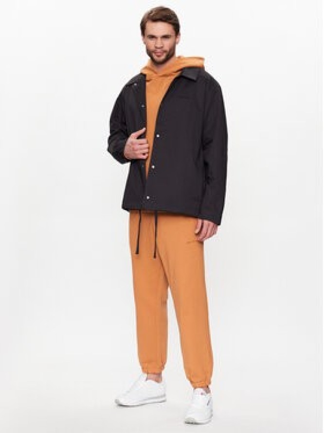 New Balance Kurtka przejściowa MJ23552 Czarny Relaxed Fit