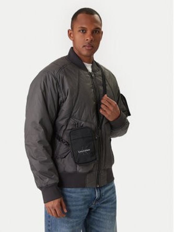 Calvin Klein Saszetka Bold Logo Nylon Slim Reporter LV04D3231G Czarny