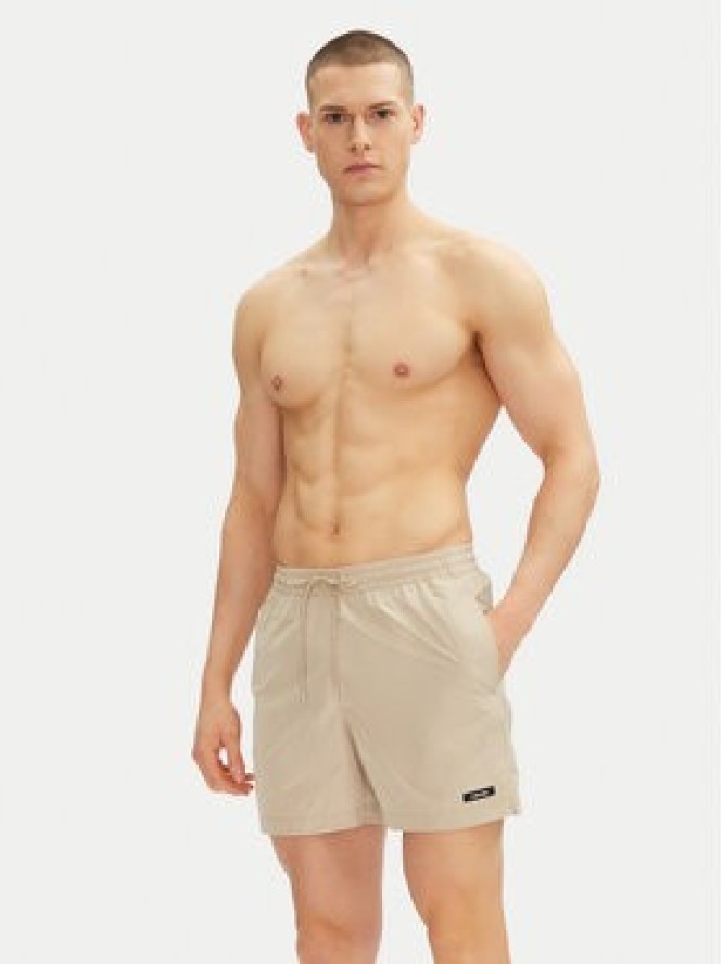 Calvin Klein Swimwear Szorty kąpielowe KM0KM01111 Beżowy Regular Fit