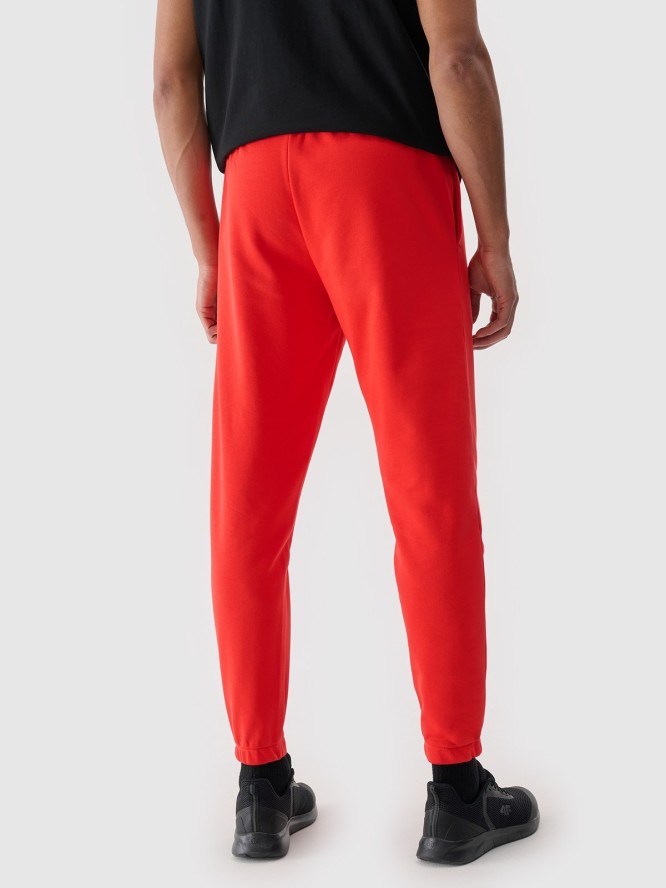 4F Spodnie dresowe joggery męskie - czerwone L