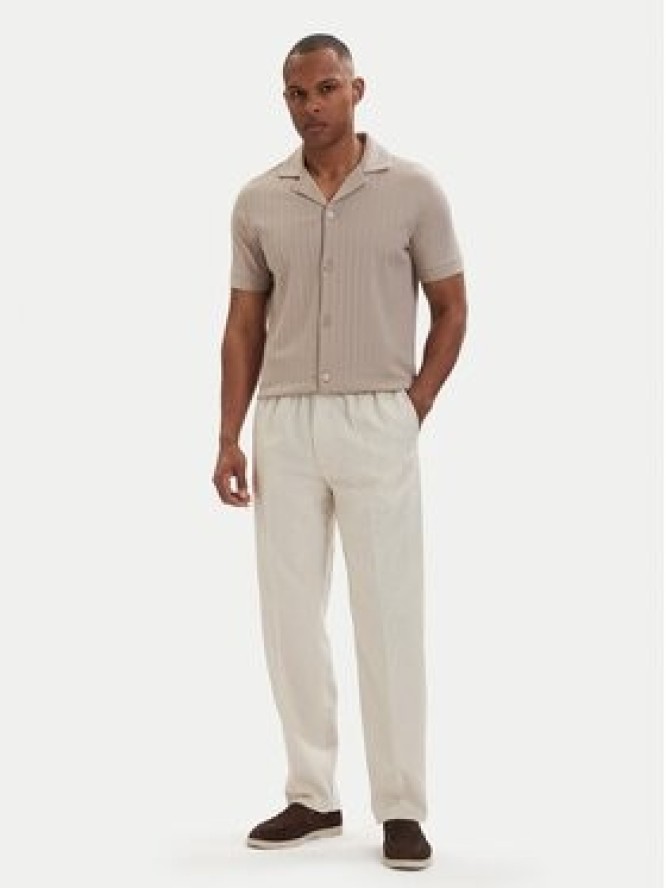 Calvin Klein Spodnie materiałowe LV04LF619G Beżowy jasny Straight Fit