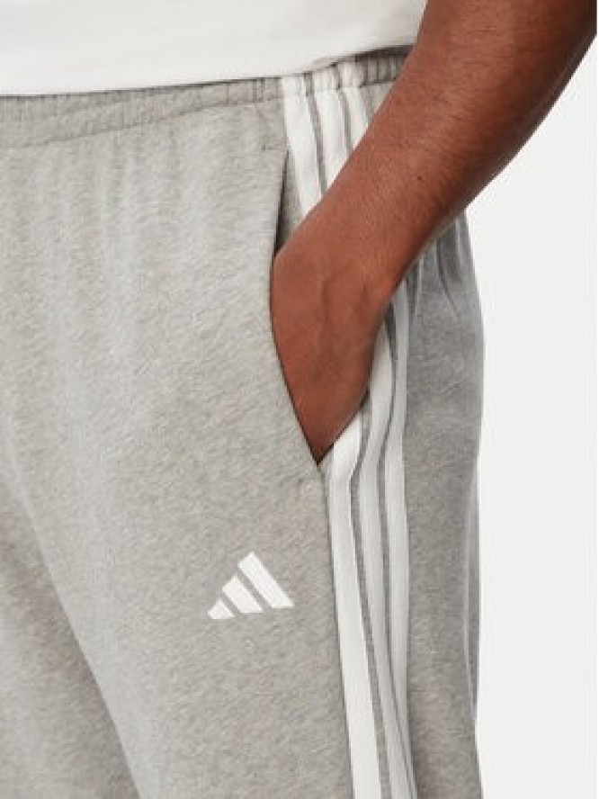 adidas Spodnie dresowe Essentials 3-Stripes KY4195 Szary jasny Regular Fit