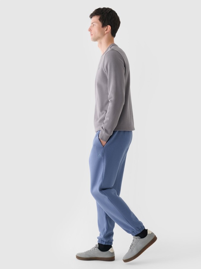 4F Spodnie dresowe joggery męskie - niebieskie S