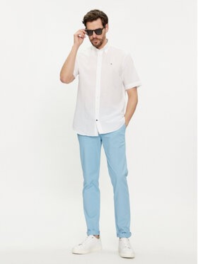 Tommy Hilfiger Chinosy Bleecker MW0MW26619 Błękitny Slim Fit