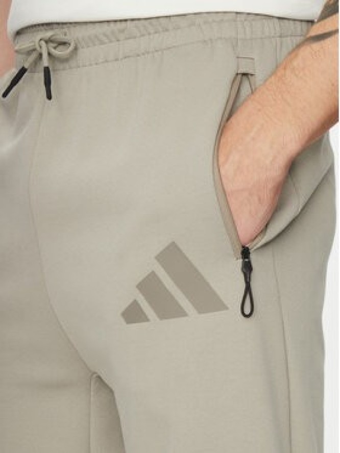 adidas Spodnie dresowe Z.N.E. Open-Hem JC6716 Beżowy Loose Fit