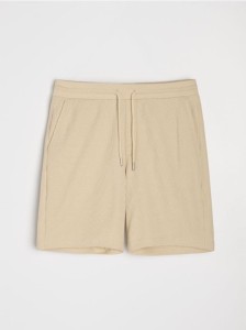 Szorty z wiązaniem - kremowy