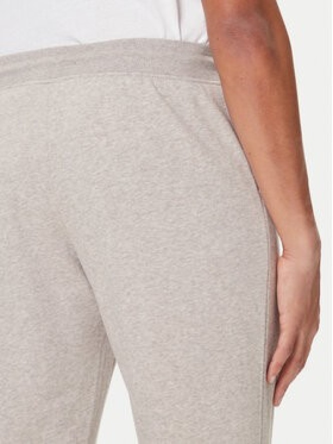 Tommy Hilfiger Spodnie dresowe UM0UM03664 Beżowy Regular Fit