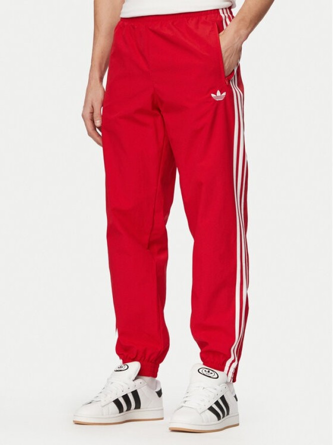 adidas Spodnie dresowe Firebird Woven KE1369 Czerwony Regular Fit