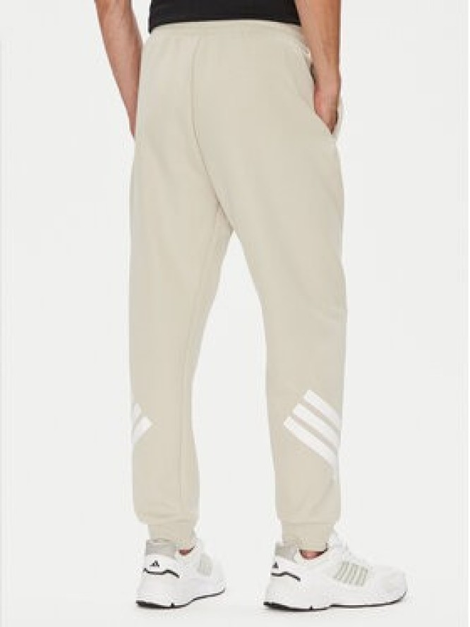 adidas Spodnie dresowe Future Icons 3-Stripes JW7092 Beżowy Regular Fit