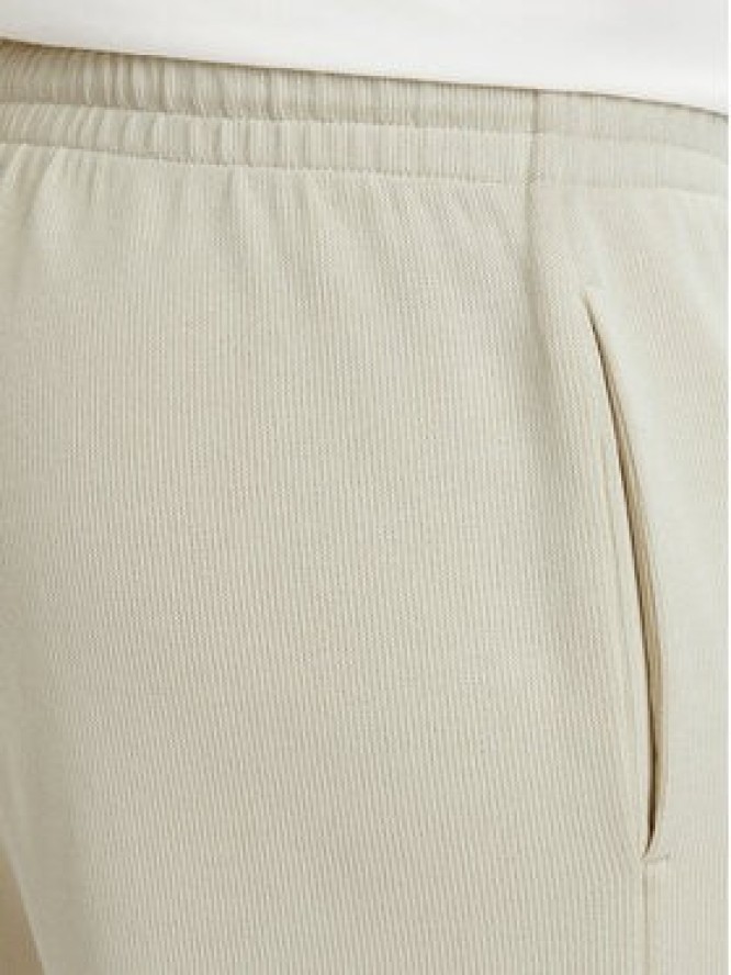 EA7 Emporio Armani Spodnie dresowe 7M002235 AF21822 U1079 Beżowy jasny Regular Fit