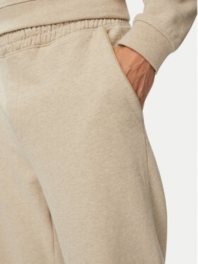 HUGO Spodnie dresowe Dalipant 50563100 Beżowy Relaxed Fit