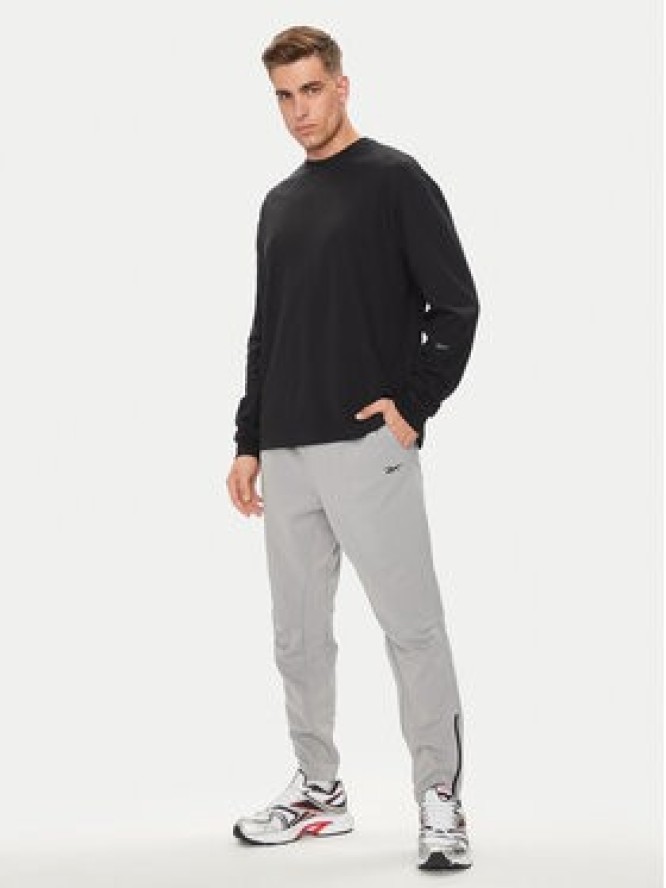 Reebok Spodnie dresowe 100075761 Szary Regular Fit