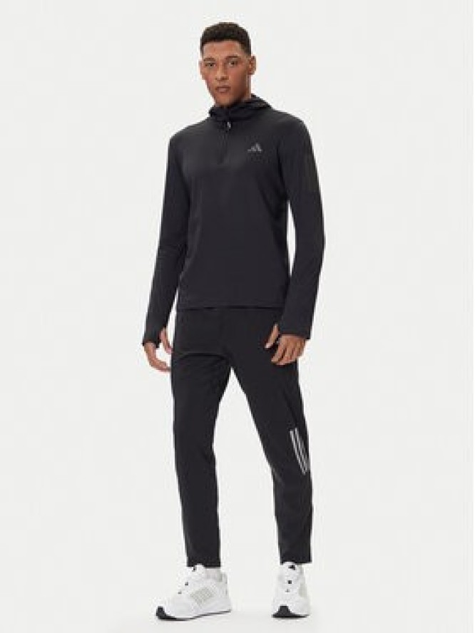 adidas Bluza techniczna Own The Run Winterized JN6378 Czarny Slim Fit