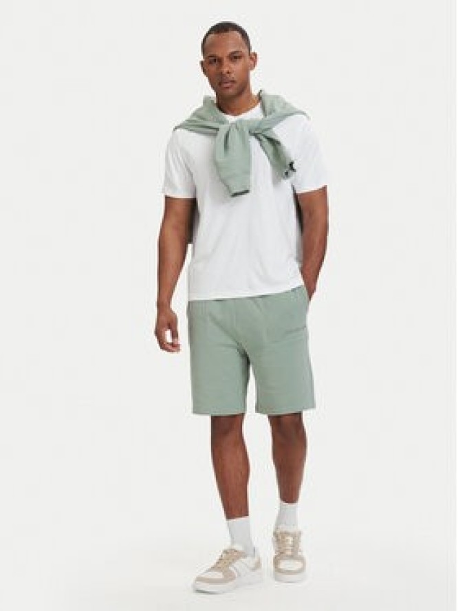 Tommy Hilfiger Szorty sportowe Essential UM0UM03914 Zielony jasny Regular Fit