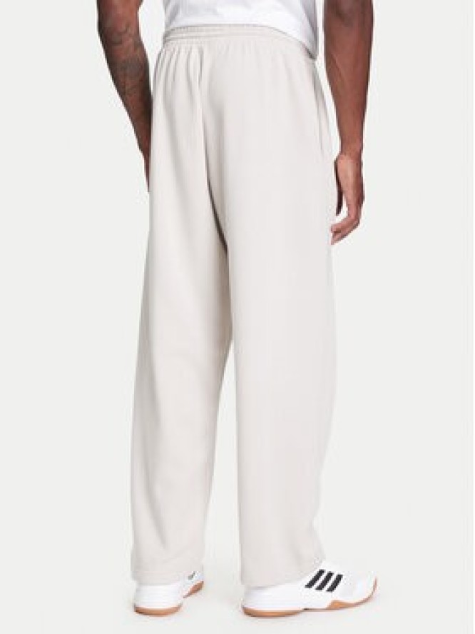 adidas Spodnie dresowe Collegiate JM9177 Beżowy Regular Fit