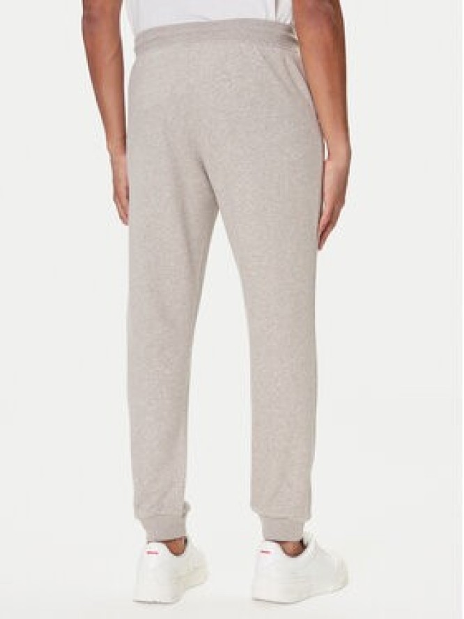 Tommy Hilfiger Spodnie dresowe UM0UM03664 Beżowy Regular Fit