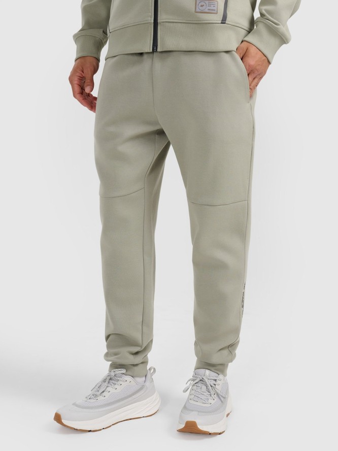 4F Spodnie dresowe joggery męskie - zielone S