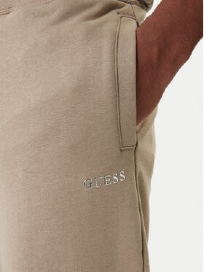 Guess Spodnie dresowe Z6RB12 KAIJ1 Beżowy Regular Fit