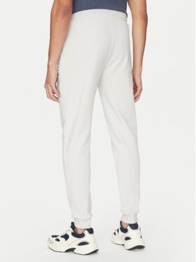 Tommy Hilfiger Spodnie dresowe UM0UM03348 Beżowy Regular Fit