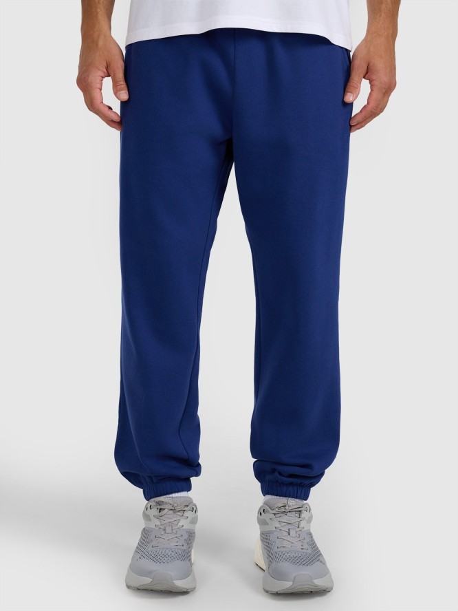 4F Spodnie dresowe joggery męskie - granatowe S